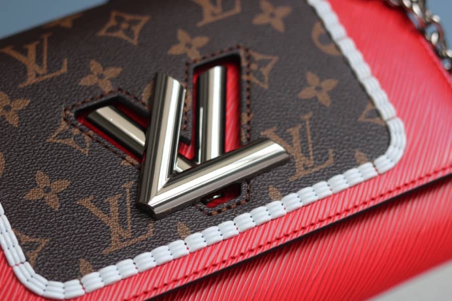 L0vis Vvtt0n Textured Epi Leather Twist Series Bag