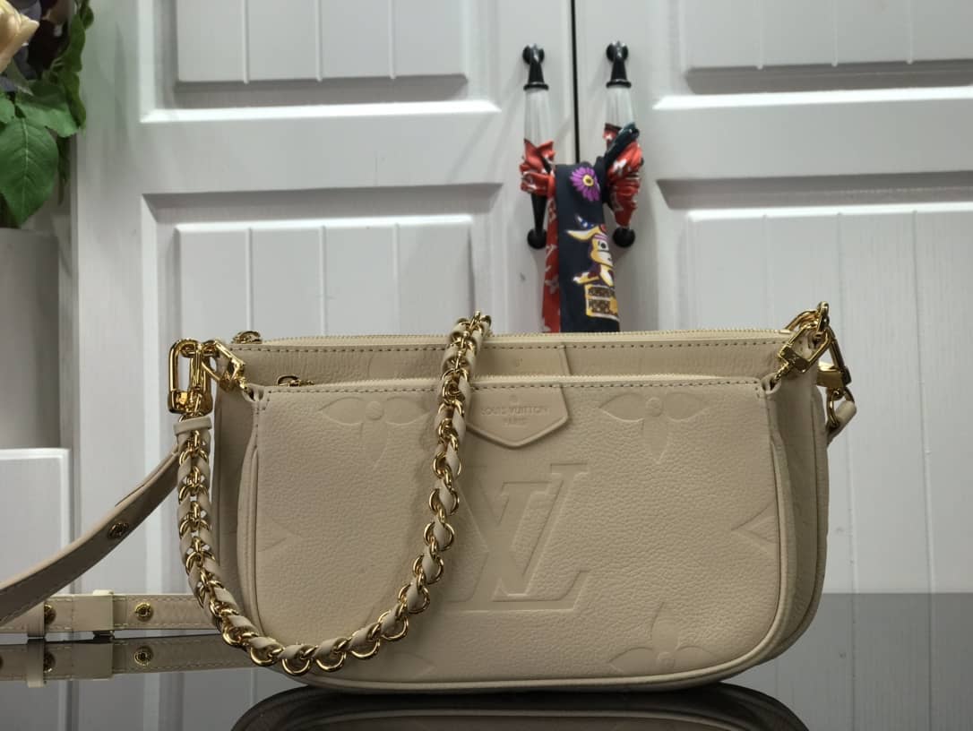 L0vis Vvtt0n Pochette Discovery Compact Replica Wallet White M57630
