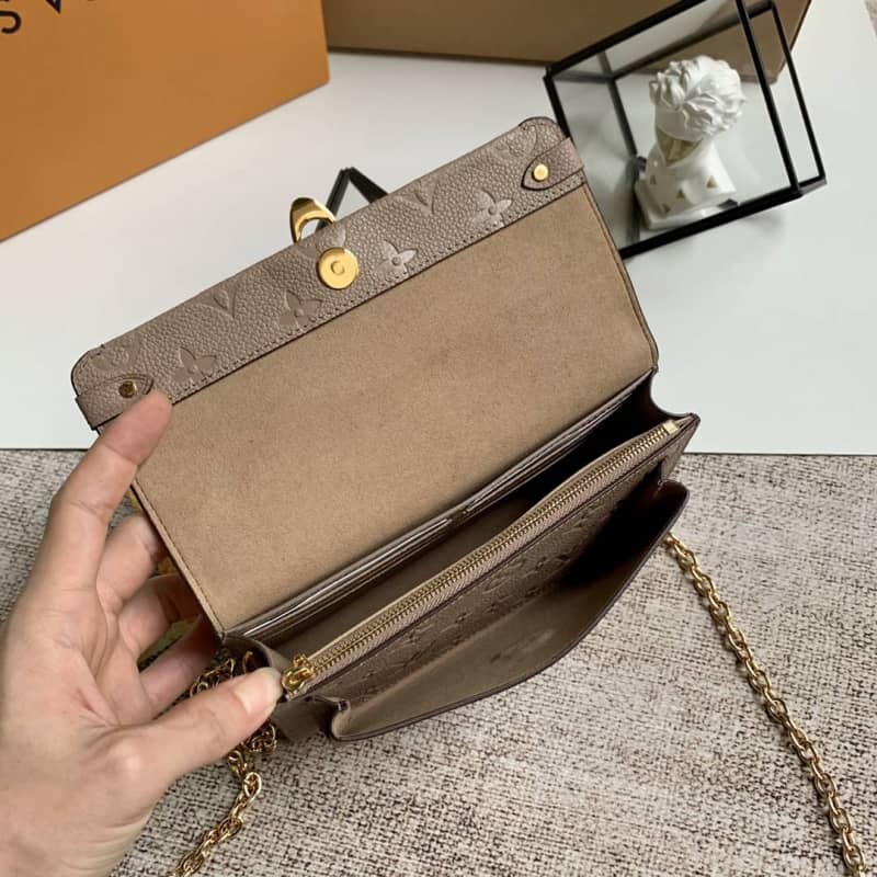 L0vis Vvtt0n Monogram Empreinte Vavin Chain Long Wallet Replica Apricot M67839