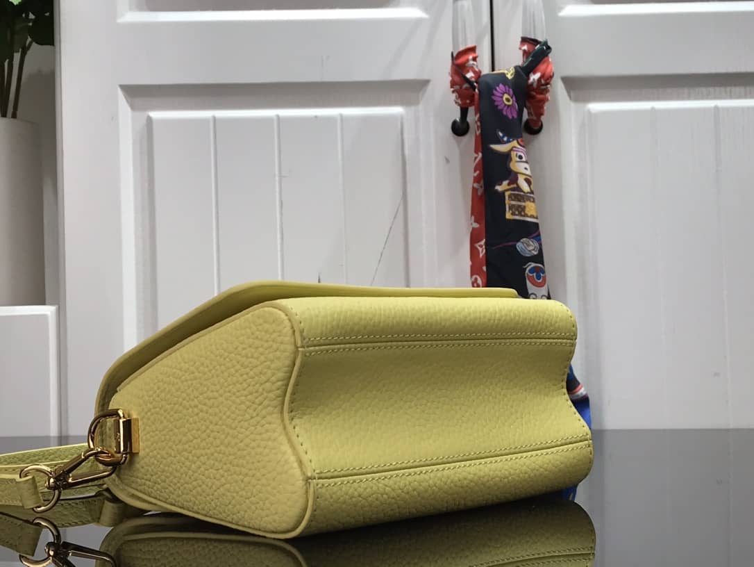 L0vis Vvtt0n Replica Bags Twist PM Pondichery Taurillon Replica Leather Bag Yellow M58691
