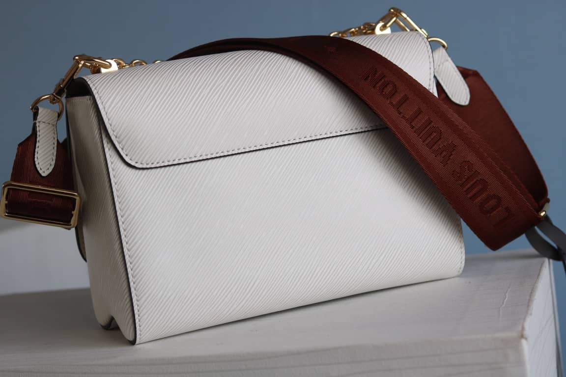 L0vis Vvtt0n Textured Epi Leather Twist Series Bag