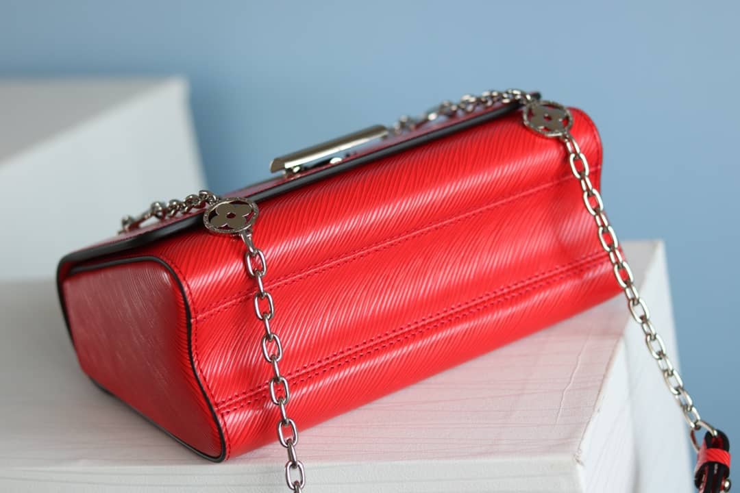 L0vis Vvtt0n Textured Epi Leather Twist Series Bag