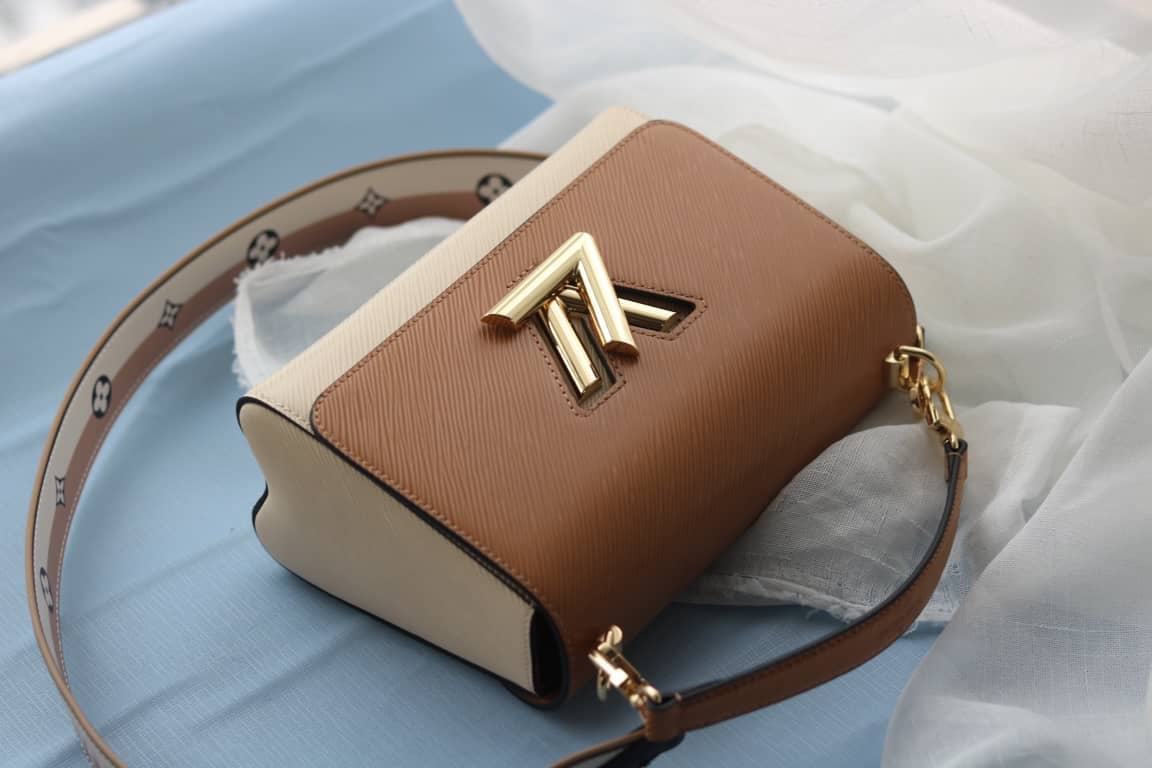 L0vis Vvtt0n Textured Epi Leather Twist Series Bag Brown