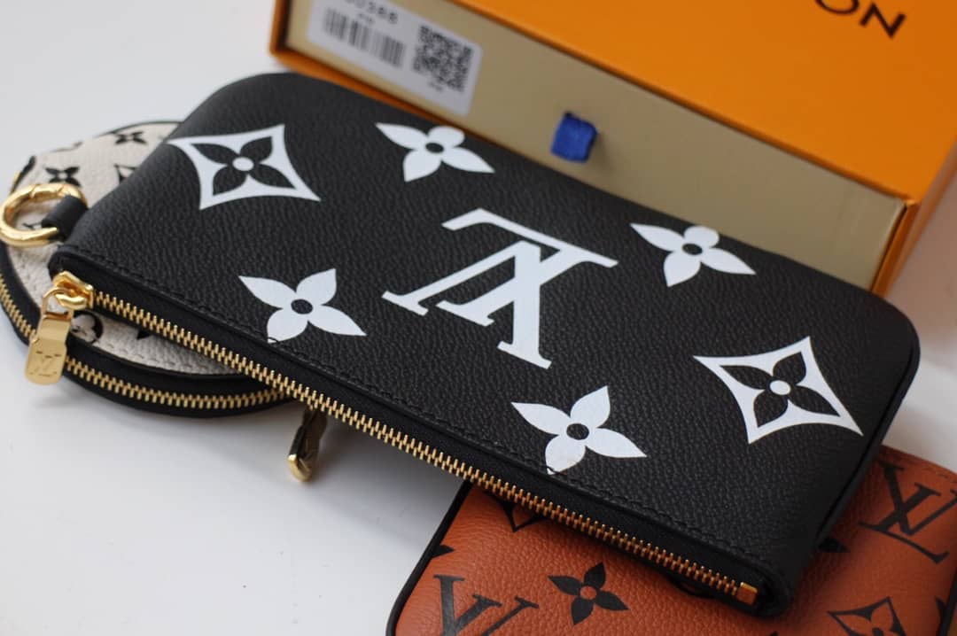L0vis Vvtt0n Crafty Trio Pouch Monogram Empreinte Replica M69516