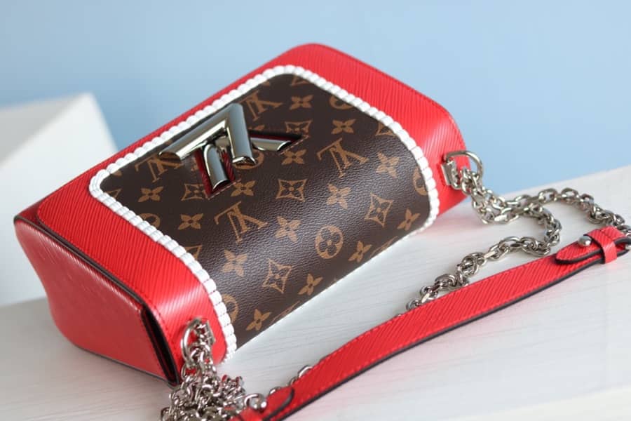 L0vis Vvtt0n Textured Epi Leather Twist Series Bag