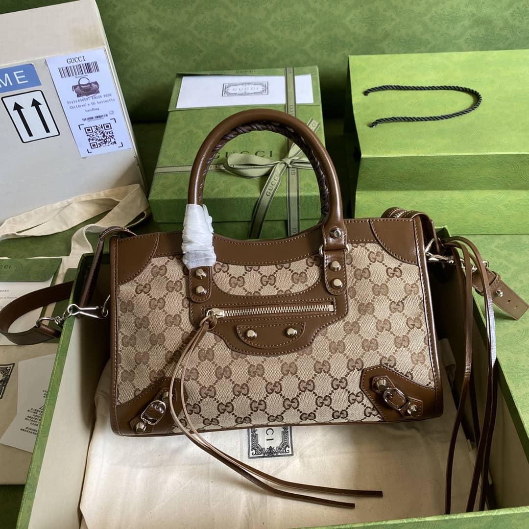 Gvc*1 x Ba1en*iaga GG Canvas City Bag Replica 658597