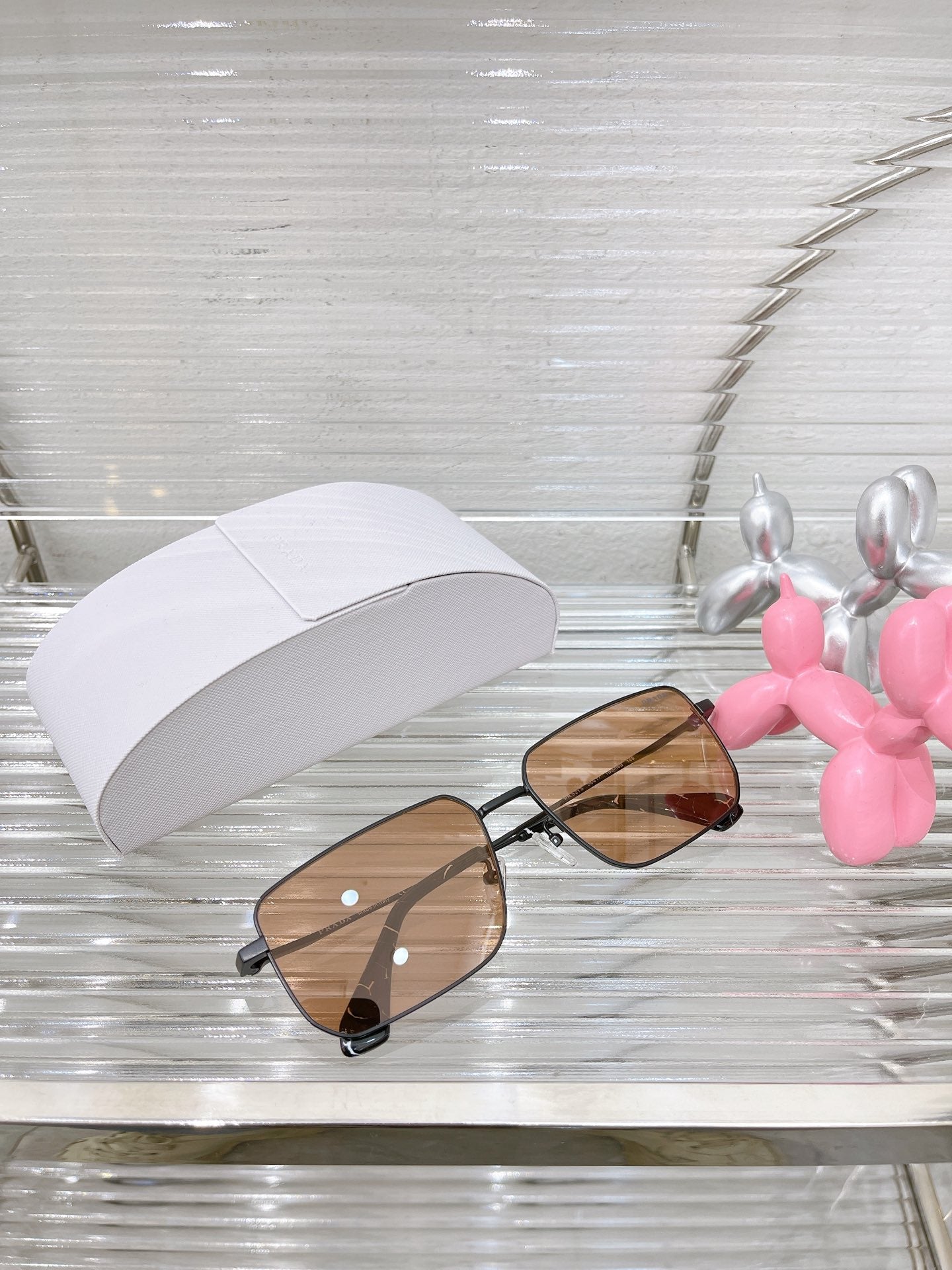 Pra*a Sunglasses
